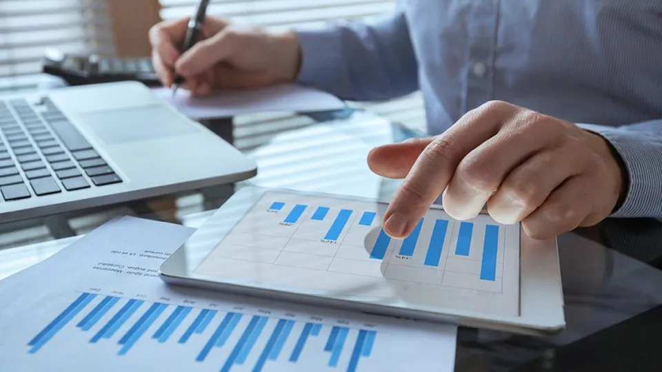 businessman working with financial report charts, business analytics and KPI